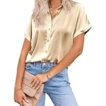 The image shows luxurious, shimmering silk fabric draped elegantly, hinting at top expensive materials.