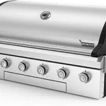 The image shows a luxurious, large outdoor barbecue grill, a contender for the most expensive BBQ grill.