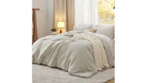 This image shows luxurious silk sheets and pillows, a highlight from the top 10 most expensive bedding list.