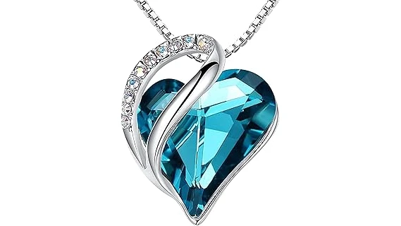 The image shows a collection of exquisite, brightly colored gemstones, likely representing the most expensive birthstones.