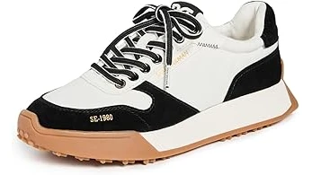 This image shows a selection of luxurious black and white shoes, ideal for a top ten list.