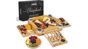 The image shows a lavish charcuterie board filled with artisanal cheeses, meats, and fruits.