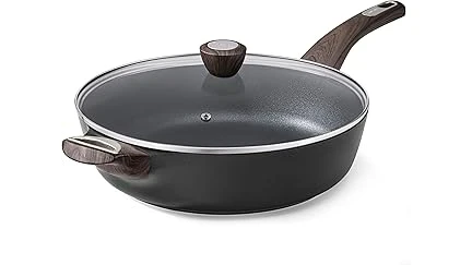 The image shows a gleaming collection of luxurious, high-end cooking pans, likely from a top 10 list.
