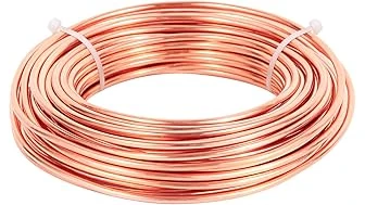 The image shows a close-up of lustrous copper wire, highlighting its premium quality for expensive applications.