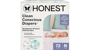 The image shows a stack of luxurious baby diapers, highlighting premium, expensive options.