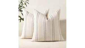 The image shows a collection of luxurious decorative pillows, highlighting expensive styles for any home.