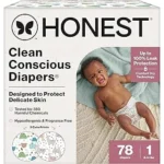 The image shows a selection of premium disposable diapers arranged artistically, suggesting top luxury brands.