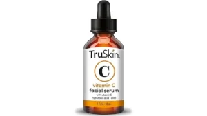 The image shows a luxurious collection of high-end face serums, highlighting top expensive skincare.