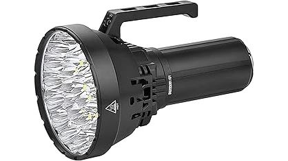 The image shows a collection of highly polished, premium flashlights, likely from the top 10 most expensive list.