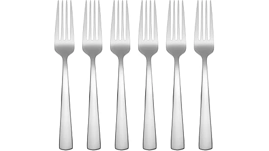 The image shows a collection of ornate, expensive-looking forks, potentially from a top 10 list.