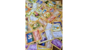 The image shows a collection of rare Pokemon cards, possibly from the Top 10 Most Expensive Fossil Pokemon Cards list.