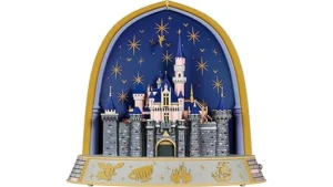 The image shows several dazzling, ornate Christmas tree ornaments, potentially from the Top 10 Most Expensive Hallmark Ornaments list.