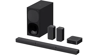 The image shows a luxurious, expansive home theater room featuring plush seating and advanced projection technology.