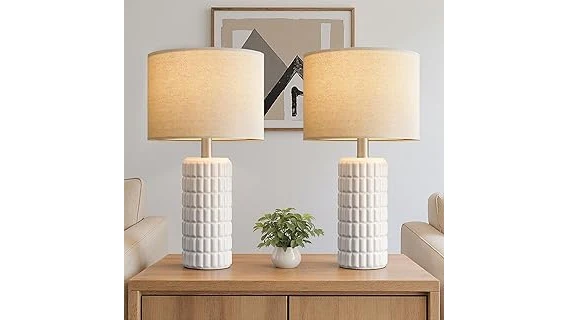 The image shows an opulent, intricate lamp, hinting at luxury lighting brands.