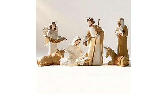 This image shows an intricately detailed, large-scale nativity set with figures in a stable setting.
