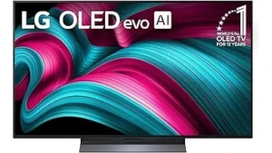 The image shows a luxurious living room displaying a premium OLED television, perfect for a top 10 expensive list.