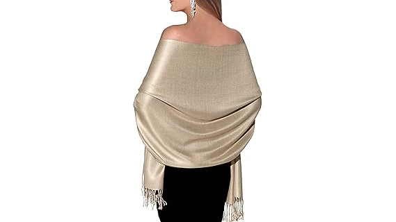 The image shows luxurious, finely woven pashmina shawls, likely from the top 10 most expensive collection.
