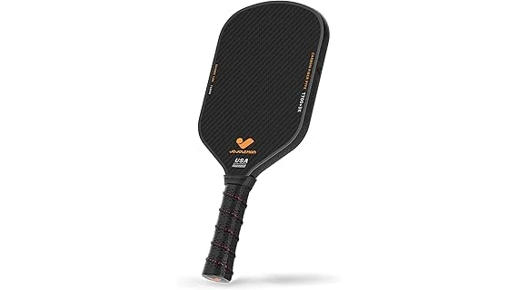 The image shows a high-end pickleball paddle, likely one of the most expensive.