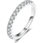 The image shows a dazzling diamond engagement ring, perfect for a feature on top wedding rings.