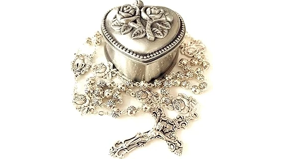 The image shows a luxurious, jewel-encrusted rosary, likely among the world's most expensive.