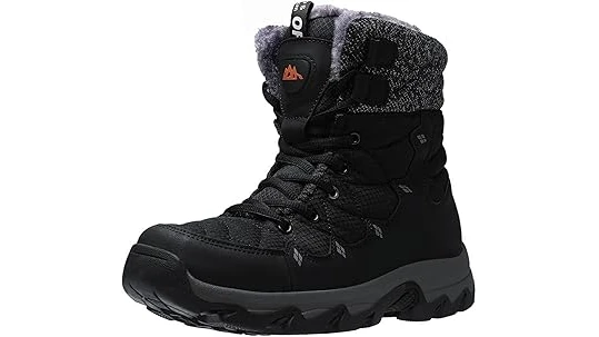 This image shows luxurious, designer snow boots perfect for cold weather adventures.
