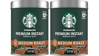 The image shows a lavish, gold-accented coffee drink, possibly representing an expensive Starbucks creation.
