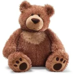 The image shows a luxurious teddy bear, a perfect example from top expensive brands.