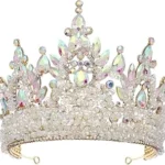 The image shows a woman wearing a dazzling diamond and emerald tiara from the Top 10 Most Expensive Tiaras list.