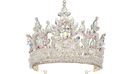 The image shows a woman wearing a dazzling diamond and emerald tiara from the Top 10 Most Expensive Tiaras list.