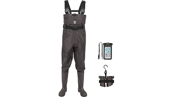 This image shows an angler wearing high-quality waders in a scenic outdoor fishing environment.