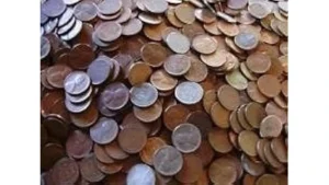 The image shows a collection of valuable vintage wheat penny coins, potentially some of the most expensive.