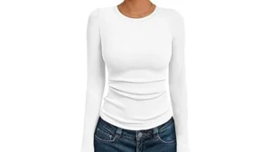 This image shows a luxurious white dress shirt, highlighting its premium fabric and craftsmanship for a top 10 list.