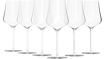 The image shows a collection of elegant, clear wine glasses showcasing their delicate craftsmanship.