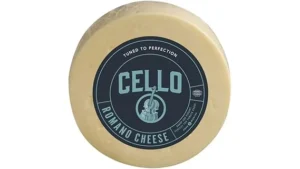 The image shows a large, aged wheel of cheese, perfect for a luxurious tasting.