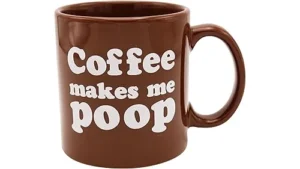 The image shows a pile of dark roasted coffee beans, hinting at expensive coffees.