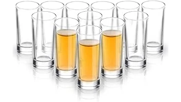 The image shows a sophisticated collection of premium soju bottles, hinting at the top five most expensive varieties.